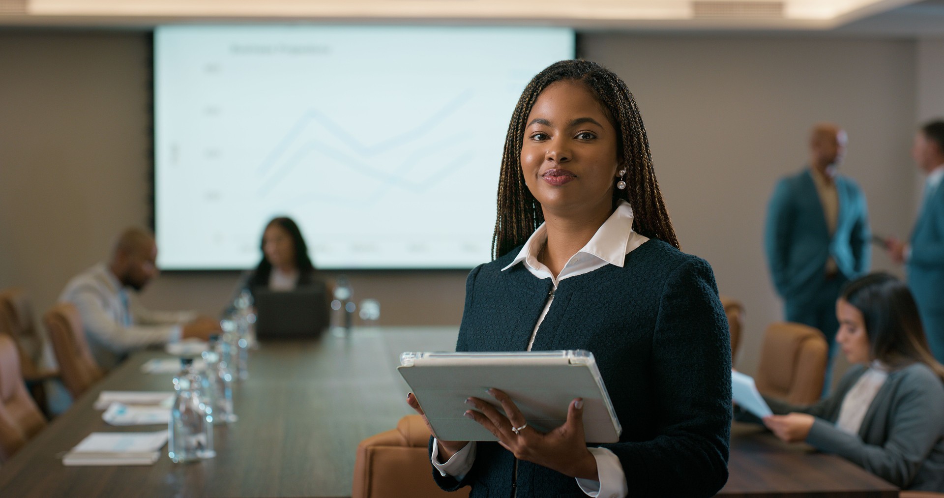 Business woman, portrait and tablet in office for financial consultant, meeting or feedback. Graphs, accounting or employee with tech, digital app or charts for profit growth, proposal or opportunity